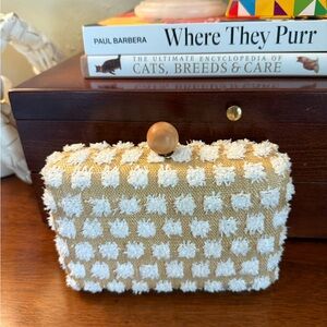Chic Tan and White Clutch